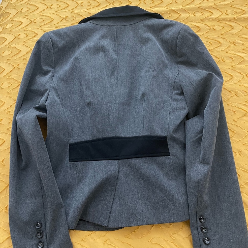 New York & Company 7th Avenue design studio 2 of gray suit with black collar.